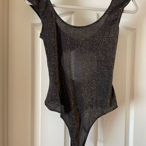 Size m Bebe thing body suit, black, gold shimmer